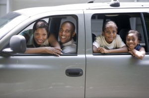 Family in Their SUV --- Image by © Royalty-Free/Corbis